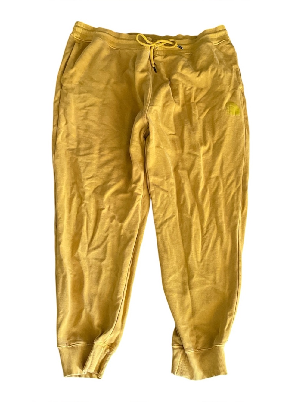 The North Face men’s mustard yellow sweatpants
